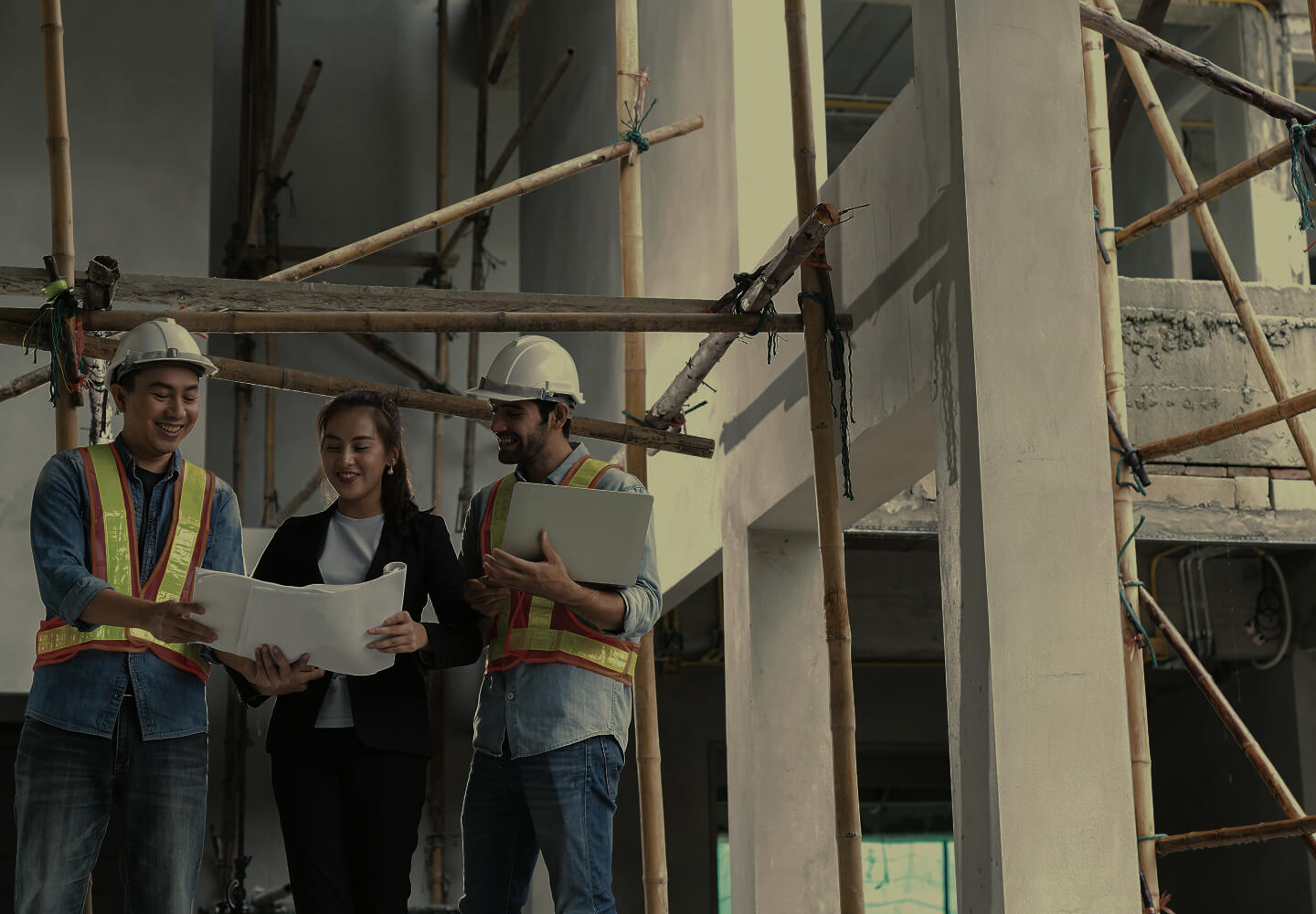 Engineers reviewing plans on a construction site